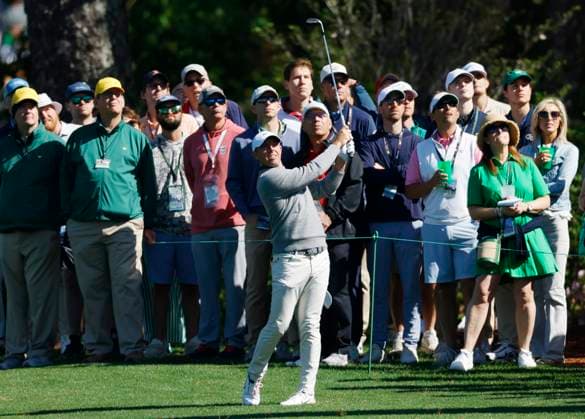 Rory McIlroy of Northern Ireland hits his approach shot to the second green during round two of the 2025 Masters golf tournament at Augusta National Golf Club in Augusta, Georgia, on Friday, April 11, 2025.  AUG20250411529 JOHNxANGELILLO