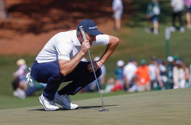 Justin Rose of England lines up a putt on the ninth hole during round two of the 2025 Masters golf tournament at Augusta National Golf Club in Augusta, Georgia, on Friday, April 11, 2025.  AUG20250411550 TANNENxMAURY