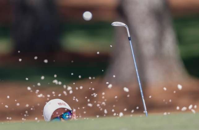 Adam Scott of Australia hits out of a bunker on the seventh hole during round two of the 2025 Masters golf tournament at Augusta National Golf Club in Augusta, Georgia, on Friday, April 11, 2025.  AUG20250411551 TANNENxMAURY