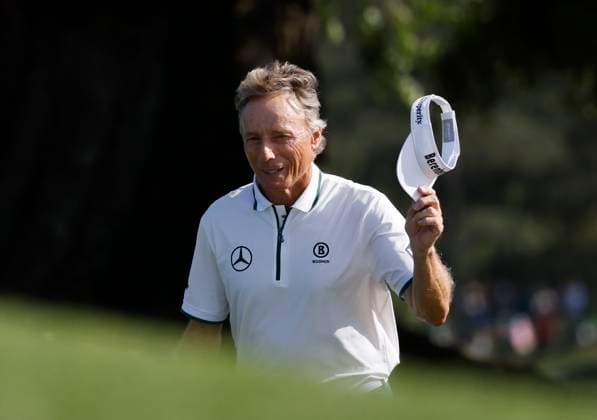 Bernhard Langer of Germany walks to the 18th green during the second round of the 2025 Masters golf tournament at Augusta National Golf Club in Augusta, Georgia, on Friday, April 11, 2025. Langer a two-time winner of the green jacket in 1985 and 1993 had announced that his 41st Masters appearance will be his last. Langer missed the cut making a bogey on the 18th hole.  AUG202504112009 JOHNxANGELILLO