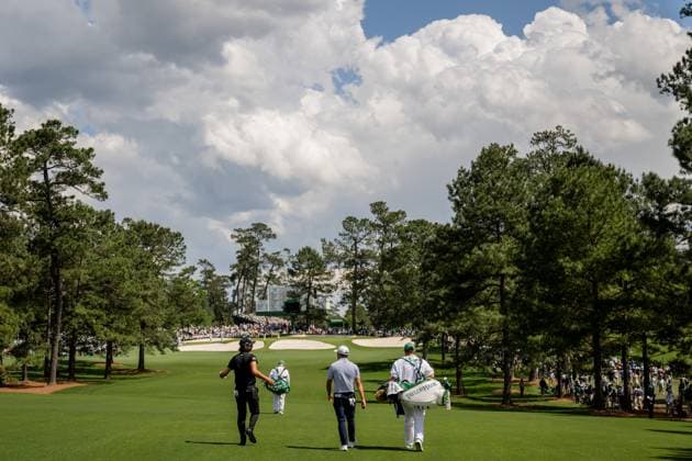 250411 Min Woo Lee of Australia and Collin Morikawa of the United States during the second round of the 2025 Masters Golf Tournament on April 11, 2025 in Augusta Photo Petter Arvidson BILDBYRAN kod PA PA1008 bbeng golf masters the masters augusta us masters  Copyright: PETTERxARVIDSON BB250411PA210