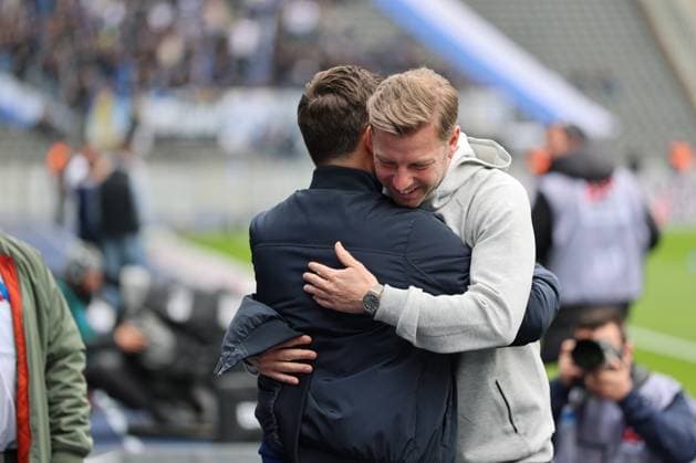2 Soccer Bundesliga, Hertha BSC SV Darmstadt Coach Stefan Leitl Hertha BSC Berlin , left, and Coach Florian Kohfeldt SV Darmstadt , during the match in the 2 Soccer Bundesliga, Hertha BSC SV Darmstadt in Berlin, Olympiastadion, on 12 04 2025 DFB regulations prohibit any use of photographs as image sequences and or quasi video Copyright: xBEAUTIFULxSPORTS Frankex