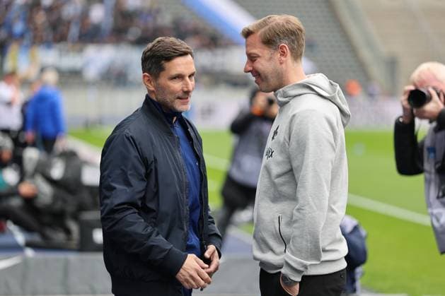 2 Soccer Bundesliga, Hertha BSC SV Darmstadt Coach Stefan Leitl Hertha BSC Berlin , left, and Coach Florian Kohfeldt SV Darmstadt , during the match in the 2 Soccer Bundesliga, Hertha BSC SV Darmstadt in Berlin, Olympiastadion, on 12 04 2025 DFB regulations prohibit any use of photographs as image sequences and or quasi video Copyright: xBEAUTIFULxSPORTS Frankex