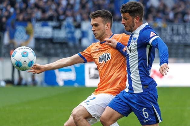 Berlin,12 4 25, Soccer, 2 Bundesliga, Matchday 29, Hertha BSC SV Darmstadt 98, Olympiastadion Lopez Sergio of SV Darmstadt 98 fights for the ball against Berlins Diego Demme DFL regulations and DFB regulations prohibit any use of photographs as image sequences and or quasi video, Foto Andreas Gora Hertha BSC SV Darmstadt 98