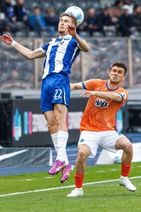 Berlin,12 4 25, Soccer, 2 Bundesliga, Matchday 29, Hertha BSC SV Darmstadt 98, Olympiastadion Lopez Sergio of SV Darmstadt 98 fights Berlins Marten Winkler for the ball DFL regulations and DFB regulations prohibit any use of photographs as image sequences and or quasi video, Foto Andreas Gora Hertha BSC SV Darmstadt 98