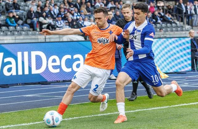 Berlin,12 4 25, Soccer, 2 Bundesliga, Matchday 29, Hertha BSC SV Darmstadt 98, Olympiastadion Lopez Sergio of SV Darmstadt 98 fights for the ball against Berlins Ibrahim Maza DFL regulations and DFB regulations prohibit any use of photographs as image sequences and or quasi video, Foto Andreas Gora Hertha BSC SV Darmstadt 98