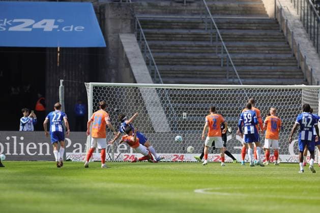 2 Soccer Bundesliga, Hertha BSC SV Darmstadt No goal Fabian Reese Hertha BSC Berlin 11 , on the ground, scores from an offside position against goalkeeper Marcel Schuhen SV Darmstadt 1 into the goal, Guille Bueno SV Darmstadt 3 cannot intervene, can no longer reach the ball, during the match in the 2 Soccer Bundesliga, Hertha BSC SV Darmstadt in Berlin, Olympiastadion, on 12 04 2025 DFB regulations prohibit any use of photographs as image sequences and or quasi video Copyright: xBEAUTIFULxSPORTS Frankex