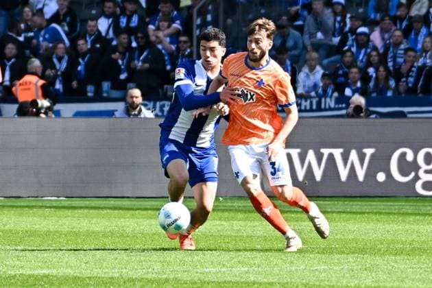 Soccer 2 Bundesliga, Hertha BSC Berlin SV Darmstadt 98 12 04 2025, xdanx, Soccer 2 Bundesliga, Hertha BSC Berlin SV Darmstadt 98 v l Ibrahim Maza Hertha BSC , Killian Corredor SV Darmstadt 98 Zweikampf, Duell, Kampf, tackle DFL DFB REGULATIONS PROHIBIT ANY USE OF PHOTOGRAPHS as IMAGE SEQUENCES and or QUASI VIDEO Daniel Lakomski Mix1Press Berlin Olympiastadion Berlin Germany DEU Copyright: xDanielxLakomskix