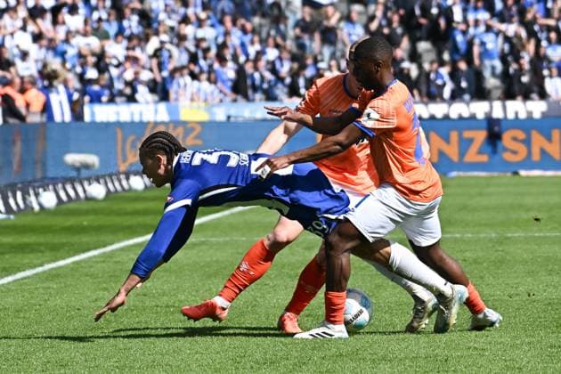 Soccer 2 Bundesliga, Hertha BSC Berlin SV Darmstadt 98 12 04 2025, xdanx, Soccer 2 Bundesliga, Hertha BSC Berlin SV Darmstadt 98 v l Derry Scherhant Hertha BSC ,Merveille Papela SV Darmstadt 98 ,Clemens Riedel SV Darmstadt 98 duel, duel, fight, tackle DFL DFB REGULATIONS PROHIBIT ANY USE OF PHOTOGRAPHS as IMAGE SEQUENCES and or QUASI VIDEO Daniel Lakomski Mix1Press Berlin Olympiastadion Berlin Germany DEU Copyright: xDanielxLakomskix