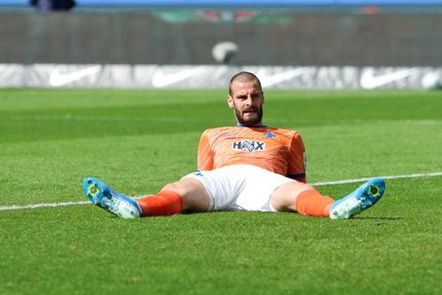 2 Soccer Bundesliga, Hertha BSC SV Darmstadt goal, own goal, Aleksandar Vukoti SV Darmstadt 29 disappointed on the ground after own goal, during the match in the 2 Soccer Bundesliga, Hertha BSC SV Darmstadt in Berlin, Olympiastadion, on 12 04 2025 DFB regulations prohibit any use of photographs as image sequences and or quasi video Copyright: xBEAUTIFULxSPORTS Frankex