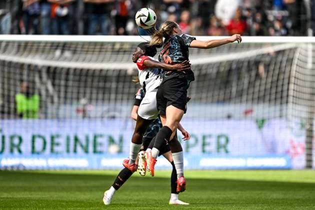 Nicole Anyomi Eintracht Frankfurt 19 in duel with Magdalena Eriksson FC Bayern Munich 5 , GER, Eintracht Frankfurt vs FC Bayern Muenchen, Soccer, Google Pixel Womens Bundesliga, Matchday 19, Season 2024 2025, 12 04 2025 DFB REGULATES PROHIBIT ANY USE OF PHOTOGRAPHS as IMAGE SEQUENCES and or QUASI VIDEO GER, Eintracht Frankfurt vs FC Bayern Muenchen, Football, Google Pixel Womens Bundesliga, Matchday 19, Season 2024 2025, 12 04 2025 Frankfurt Copyright: xEibner-Pressefoto FlorianxWiegandx EP_FWD
