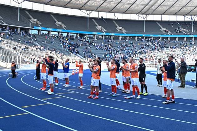 Soccer 2 Bundesliga, Hertha BSC Berlin SV Darmstadt 98 12 04 2025, xdanx, Soccer 2 Bundesliga, Hertha BSC Berlin SV Darmstadt 98 v l Team of SV Darmstadt 98 in the fan curve DFL DFB REGULATIONS PROHIBIT ANY USE OF PHOTOGRAPHS as IMAGE SEQUENCES and or QUASI VIDEO Daniel Lakomski Mix1Press Berlin Olympiastadion Berlin Germany DEU Copyright: xDanielxLakomskix