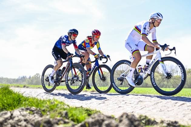 Swiss Elise Chabbey of FDJ-Suez and Australian Lauretta Hanson of Lidl-Trek pictured in action during the women s race of the Paris-Roubaix one day cycling race, 148,5 km from Denain to Roubaix, France, on Saturday 12 April 2025. JASPERxJACOBS  x120616603x
