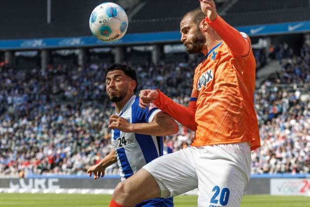 Berlin,12 4 25, Soccer, 2 Bundesliga, Matchday 29, Hertha BSC SV Darmstadt 98, Olympiastadion Berlins Kevin Sessa fights against Vukotic Aleksandar of SV Darmstadt 98 for the ball DFL regulations and DFB regulations prohibit any use of photographs as image sequences and or quasi video, Foto Andreas Gora Hertha BSC SV Darmstadt 98