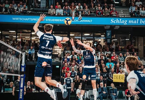 Volleyball mens season 2024 2025 Volleyball Bundesliga playoff semi-final match 3 SVG Lüneburg vs VfB Friedrichshafen 12 04 2025 Michael Patrick Wright 3 SVG Lüneburg passing to Joscha Kunstmann 7 SVG Lüneburg Lüneburg LKH Arena Niedersachsen Germany