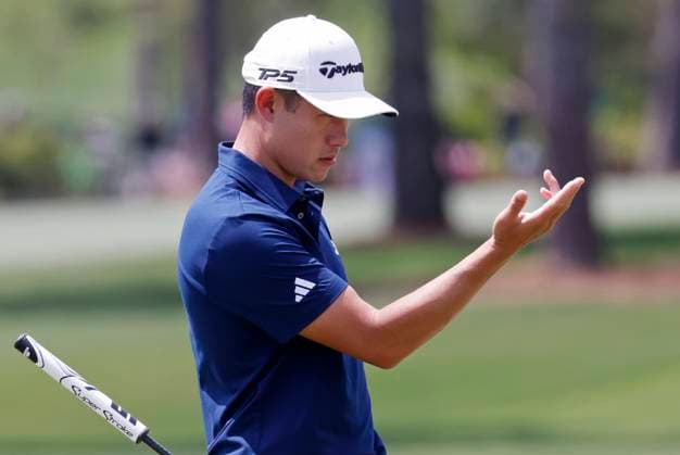 Collin Morikawa lines up a putt on the second hole during the third round of the 2025 Masters golf tournament at Augusta National Golf Club in Augusta, Georgia, on Saturday, April 12, 2025.  AUG20250412504 TANNENxMAURY