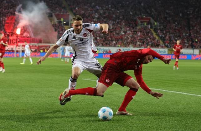 12 04 2025 Soccer Season 2024 2025 2 Soccer Bundesliga 29 Matchday 1 FC Kaiserslautern FCK Lautern Roten Teufel 1 FC Nürnberg FCN Club Sportfoto Zink DaMa xdaxmax DFL regulations prohibit any use of photographs as image sequences and or quasi video only for editorial use Lukas Schleimer 36, 1 FC Nürnberg FCN Luca Sirch 31, 1 FC Kaiserslautern FCK
