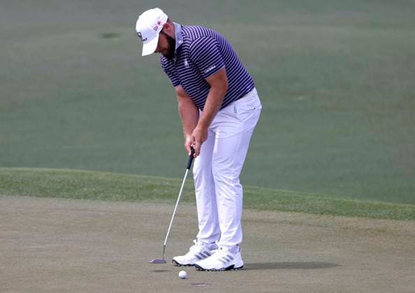 Tyrrell Hatton of England putts on the second hole during the third round of the 2025 Masters golf tournament at Augusta National Golf Club in Augusta, Georgia, on Saturday, April 12, 2025.  AUG20250412510 TANNENxMAURY