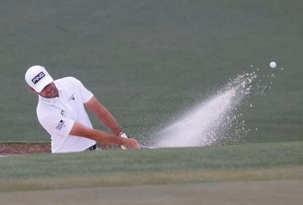 Corey Connors of Canada. hits out of a bunker on the second hole during the third round of the 2025 Masters golf tournament at Augusta National Golf Club in Augusta, Georgia, on Saturday, April 12, 2025.  AUG20250412515 TANNENxMAURY