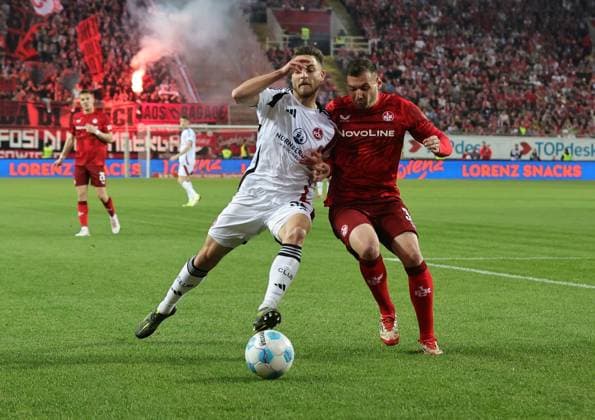 12 04 2025 Soccer Season 2024 2025 2 Soccer Bundesliga 29 Matchday 1 FC Kaiserslautern FCK Lautern Roten Teufel 1 FC Nürnberg FCN Club Sportfoto Zink DaMa xdaxmax DFL regulations prohibit any use of photographs as image sequences and or quasi video only for editorial use Lukas Schleimer 36, 1 FC Nürnberg FCN Luca Sirch 31, 1 FC Kaiserslautern FCK