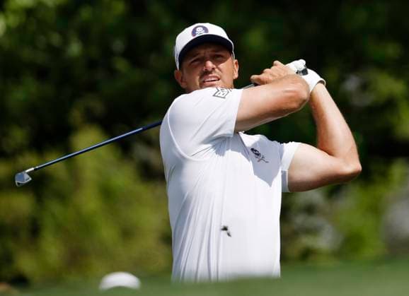 Bryson DeCambeau.hits his tee shot on the 4th hole during the third round of the 2025 Masters golf tournament at Augusta National Golf Club in Augusta, Georgia, on Saturday, April 12, 2025.  AUG20250412530 JOHNxANGELILLO