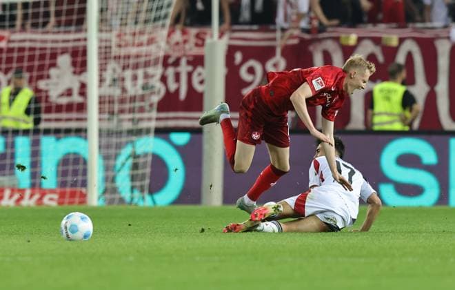 12 04 2025 Soccer Season 2024 2025 2 Soccer Bundesliga 29 Matchday 1 FC Kaiserslautern FCK Lautern Red Devils 1 FC Nürnberg FCN Club Sportfoto Zink DaMa xdaxmax DFL regulations prohibit any use of photographs as image sequences and or quasi video only for editorial use Jens Castrop 17, 1 FC Nürnberg FCN fouls Foul an 16, 1 FC Kaiserslautern FCK