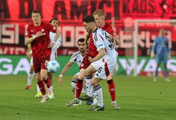12 04 2025 Soccer Season 2024 2025 2 Soccer Bundesliga 29 Matchday 1 FC Kaiserslautern FCK Lautern Roten Teufel 1 FC Nürnberg FCN Club Sportfoto Zink DaMa xdaxmax DFL regulations prohibit any use of photographs as image sequences and or quasi video only for editorial use Lukas Schleimer 36, 1 FC Nürnberg FCN 16, 1 FC Kaiserslautern FCK