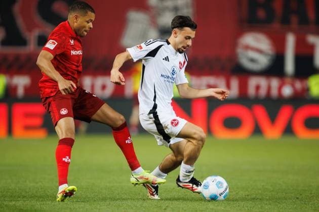 Jan Gyamerah 1 FC Kaiserslautern in duel with Berkay Yilmaz 1 FC Nuernberg 1 FC Kaiserslautern vs 1 FC Nuernberg, Soccer, 2 Bundesliga, Season 2024 2025, Matchday 29, 12 04 2025 1 FC Kaiserslautern vs 1 FC Nuernberg, Soccer, 2 Bundesliga, Season 2024 2025, Matchday 29, 12 04 2025 Kaiserslautern Copyright: xEibner-Pressefoto AlexanderxNeisx EP_ANS