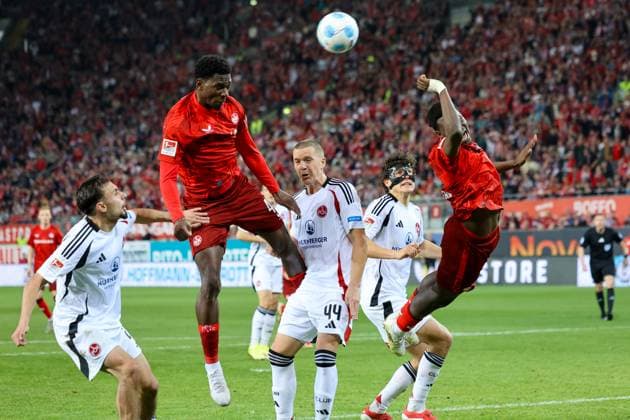 12 04 2025, xmohx, Fußball 2 Bundesliga, 1 FC Kaiserslautern 1 FC Nürnberg v l Faride Alidou 1 FC Kaiserslautern Ondrej Karafiat 1 FC Nuernberg Ragnar Ache 1 FC Kaiserslautern Zweikampf, Aktion, action, battle for the ball DFL DFB REGULATIONS PROHIBIT ANY USE OF PHOTOGRAPHS as IMAGE SEQUENCES and or QUASI VIDEO Kaiserslautern