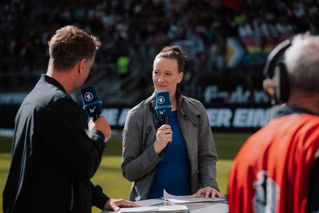 12 04 25, Women, Football, 1 BL, Season 2024 2025, Eintracht Frankfurt FC Bayern Munich, Matchday 19 Almuth Schult r and Claus Kufen l Presenter for ARD Das Erste at the desk in the Frankfurt Deutsche Bank Park stadium HE Germany