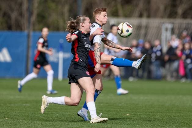 from left Carlotta Schwoerer Eintracht Frankfurt II, 16 and Jobina Lahr Hamburger SV, 31 in a duel, dynamic, action, action, game scene, THE DFB REGULATIONS PROHIBIT ANY USE OF PHOTOGRAPHS AS IMAGE SEQUENCES AND OR QUASI VIDEO , 13 04 2025, Hamburg Germany , Football, 2 Womens Bundesliga, Hamburger SV Eintracht Frankfurt II xobx