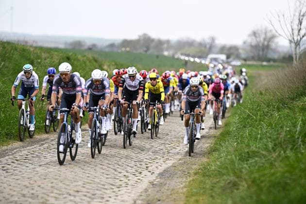 German Nils Politt of UAE Team Emirates and Belgian Gianni Vermeersch of Alpecin-Deceuninck pictured in action during the men elite race of the Paris-Roubaix one day cycling race, 259,2 km from Compiegne to Roubaix, France, on Sunday 13 April 2025. JASPERxJACOBS  x120712123x