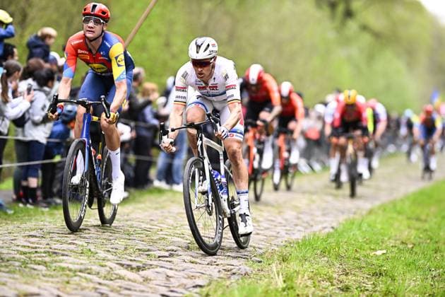 Belgian Tim Merlier of Soudal Quick-Step pictured in action at TrouÃ e d Arenberg during the men elite race of the Paris-Roubaix one day cycling race, 259,2 km from Compiegne to Roubaix, France, on Sunday 13 April 2025. JASPERxJACOBS  x120714861x