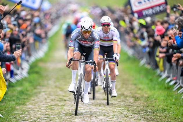 Paris Roubaix 2025 Cycling Race Roubaix, France - April 13 : Van Der Poel Mathieu (NED) of Alpecin - Deceuninck leading the peloton in the Trouee d Arenberg, Pogacar Tadej (SLO) of UAE Team Emirates - XRG behind him during the 122nd edition of Paris Roubaix an UCI World Tour cycling race for Men Elite of 259,7 kms with start in Compiegne and finish at the Velodrome Andre-Petrieux in Roubaix on April 13, 2025 in Roubaix, France, 13 04 2025 ( Motordriver Kenny Verfaillie - Roubaix France  Copyright: xNicoxVereeckenx