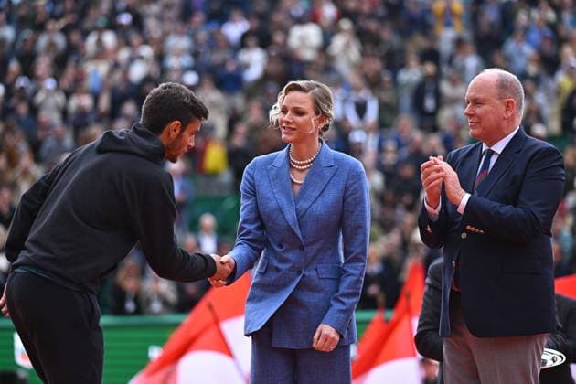 Prince Albert II And Charlene At Rolex Masters Final - Monaco Princess Charlene of Monaco and Prince Albert II of Monaco congratulate Lorenzo Musetti of Italy on his 2nd place during the trophy presentation after the singles final opposing him to Carlos Alcaraz during day eight of the Rolex Monte-Carlo Masters at Monte-Carlo Country Club on April 13, 2025 in Monte-Carlo, Monaco. Photo by Corinne Dubreuil ATP, Tennis Herren Tour ABACAPRESS.COM Monaco Monte-Carlo Monaco  Copyright: xDubreuilxCorinne ABACAx
