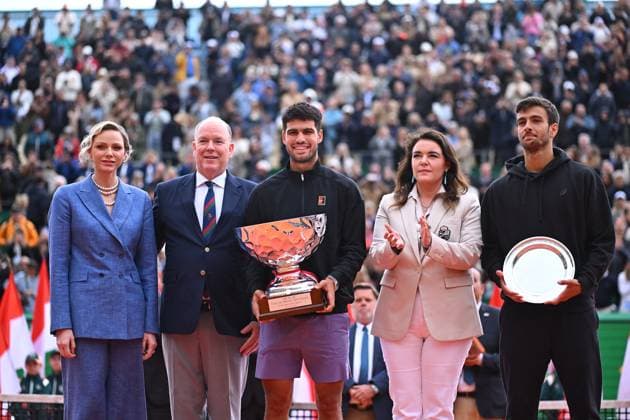 Prince Albert II And Charlene At Rolex Masters Final - Monaco (L to R) Princess Charlene of Monaco, Prince Albert II of Monaco, Carlos Alcaraz of Spain (1st place), Lorenzo Musetti of Italy (2nd place) and Melanie-Antoinette de Massy at the trophy presentation after the singles final during day eight of the Rolex Monte-Carlo Masters at Monte-Carlo Country Club on April 13, 2025 in Monte-Carlo, Monaco. Photo by Corinne Dubreuil ATP, Tennis Herren Tour ABACAPRESS.COM Monaco Monte-Carlo Monaco  Copyright: xDubreuilxCorinne ABACAx