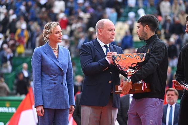 Prince Albert II And Charlene At Rolex Masters Final - Monaco (L to R) Princess Charlene of Monaco and Prince Albert II of Monaco congratulate Carlos Alcaraz of Spain on his 1st place at the trophy presentation after the singles final during day eight of the Rolex Monte-Carlo Masters at Monte-Carlo Country Club on April 13, 2025 in Monte-Carlo, Monaco. Photo by Corinne Dubreuil ATP, Tennis Herren Tour ABACAPRESS.COM Monaco Monte-Carlo Monaco  Copyright: xDubreuilxCorinne ABACAx