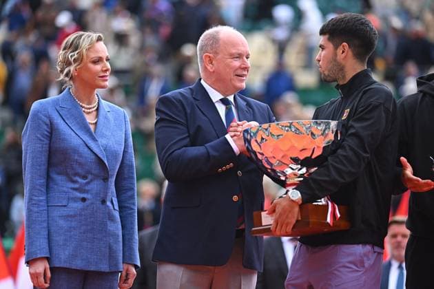 Prince Albert II And Charlene At Rolex Masters Final - Monaco (L to R) Princess Charlene of Monaco and Prince Albert II of Monaco congratulate Carlos Alcaraz of Spain on his 1st place at the trophy presentation after the singles final during day eight of the Rolex Monte-Carlo Masters at Monte-Carlo Country Club on April 13, 2025 in Monte-Carlo, Monaco. Photo by Corinne Dubreuil ATP, Tennis Herren Tour ABACAPRESS.COM Monaco Monte-Carlo Monaco  Copyright: xDubreuilxCorinne ABACAx