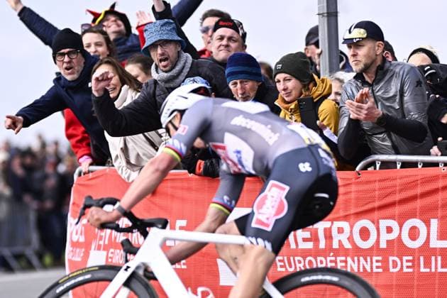 Cycling fans and supporters cheer for Dutch Mathieu van der Poel of Alpecin-Deceuninck during the men elite race of the Paris-Roubaix one day cycling race, 259,2 km from Compiegne to Roubaix, France, on Sunday 13 April 2025. JASPERxJACOBS  x120722837x