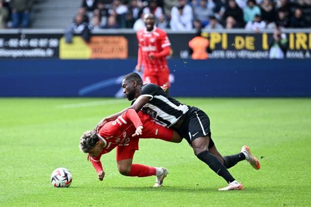 Angers SCO v Montpellier Herault SC - Ligue 1 McDonald s 2024 2025 22 Khalil FAYAD (mhsc) - 06 Jean-Eudes AHOLOU (sco) during the Ligue 1 McDonald s match between Angers and Montpellier at Stade Raymond Kopa on April 13, 2025 in Angers, France. Angers France  Copyright: xFEPx 776306824