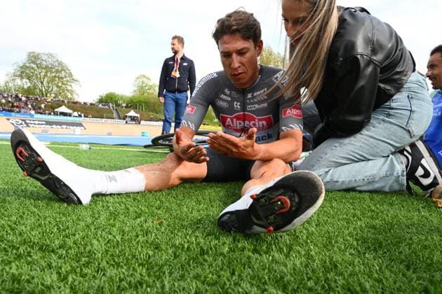 Paris Roubaix 2025 Cycling Race Roubaix, France - April 13 : Philipsen Jasper (BEL) of Alpecin-Deceuninck and his girlfriend Melanie Peetermans after the race during the 122nd edition of Paris Roubaix an UCI World Tour cycling race for Men Elite of 259,7 kms with start in Compiegne and finish at the Velodrome Andre-Petrieux in Roubaix on April 13, 2025 in Roubaix, France, 13 04 2025 ( Motordriver Kenny Verfaillie - Roubaix France  Copyright: xVincentxKalutx