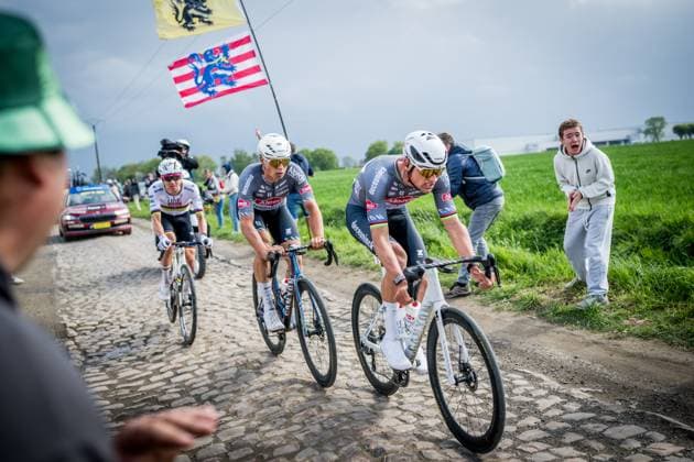 Slovenian Tadej Pogacar of UAE Team Emirates, Belgian Jasper Philipsen of Alpecin-Deceuninck and Dutch Mathieu van der Poel of Alpecin-Deceuninck pictured in action during the men elite race of the Paris-Roubaix one day cycling race, 259,2 km from Compiegne to Roubaix, France, on Sunday 13 April 2025. JASPERxJACOBS  x120734062x