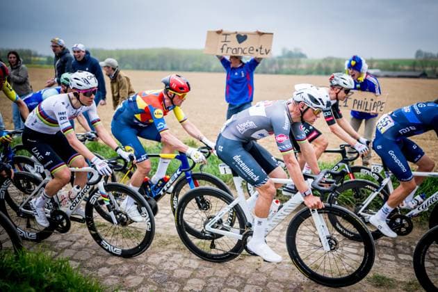 Slovenian Tadej Pogacar of UAE Team Emirates and Dutch Mathieu van der Poel of Alpecin-Deceuninck pictured in action during the men elite race of the Paris-Roubaix one day cycling race, 259,2 km from Compiegne to Roubaix, France, on Sunday 13 April 2025. JASPERxJACOBS  x120734103x