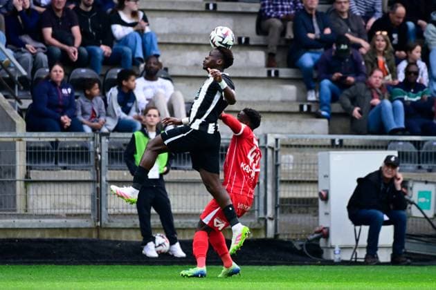 FOOTBALL : Angers vs Montpellier - Ligue 1 - 13 04 2025 Jacques Ekomie ( 3 - Angers ) and Wilfried Ndollo Bille ( 49 - Montpellier ) during the Ligue 1 match between Angers SCO and Montpellier HSC at Stade Raymond Kopa on April 13, 2025 in Angers, France. ( Photo by Dante Badano PsnewZ ) - AngersFrance  Copyright: xDantexBadanox