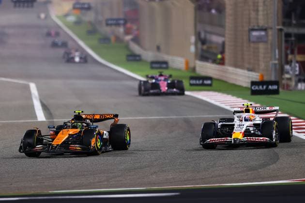 F1 - BAHRAIN GRAND PRIX 2025 04 NORRIS Lando (gbr), McLaren F1 Team MCL39, action and 30 LAWSON Liam (nzl), Visa Cash App RB F1 Team VCARB02 during the Formula 1 Gulf Bahrain Grand Prix 2025, 4th round of the 2025 FIA Formula One World Championship, WM, Weltmeisterschaft from April 11 to 13, 2025 on the Bahrain International Circuit, in Sakhir, Bahrain - SakhirBahrain  Copyright: xEricxAlonsox