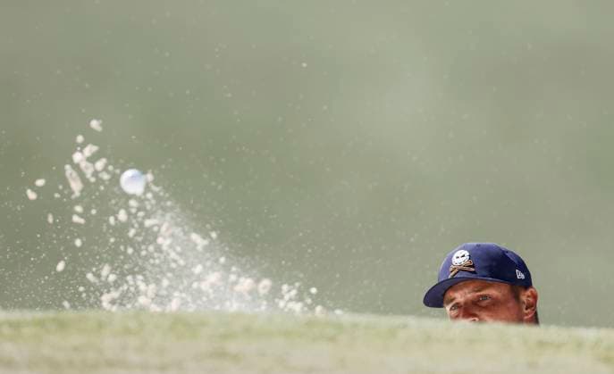 Bryson DeCambeau hits out of a bunker onto the 7th green during the final round of the 2025 Masters golf tournament at Augusta National Golf Club in Augusta, Georgia, on Sunday, April 13, 2025.  AUG20250413542 TANNENxMAURY