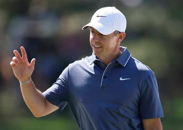 Rory McIlroy of Northern Ireland waves as he walks onto the 7th green during the final round of the 2025 Masters golf tournament at Augusta National Golf Club in Augusta, Georgia, on Sunday, April 13, 2025.  AUG20250413540 TANNENxMAURY