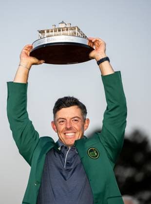 250413 Rory McIlroy of Northern Ireland celebrates with the trophy and his green jacket after winning the final round of the 2025 Masters Golf Tournament on April 13, 2025 in Augusta Photo Petter Arvidson BILDBYRAN kod PA PA1010 bbeng golf masters the masters augusta us masters jubel  Copyright: PETTERxARVIDSON BB250413PA172