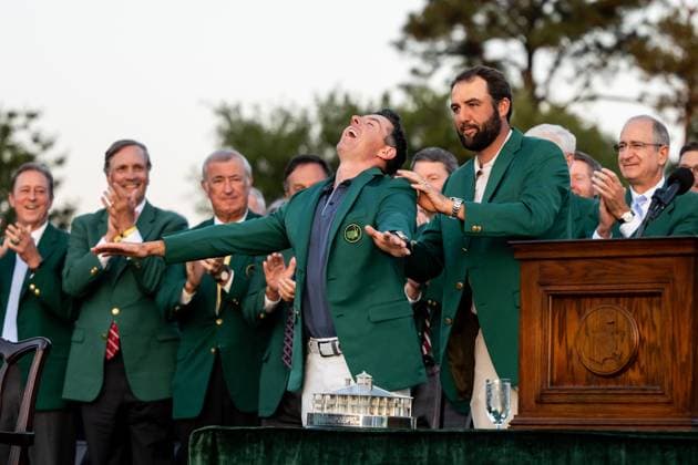 250413 Rory McIlroy of Northern Ireland is awarded the Green Jacket by Masters Champion Scottie Scheffler during the ceremony after the final round of the 2025 Masters Golf Tournament on April 13, 2025 in Augusta Photo Petter Arvidson BILDBYRAN kod PA PA1010 bbeng golf masters the masters augusta us masters  Copyright: PETTERxARVIDSON BB250413PA178