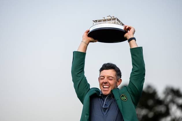 250413 Rory McIlroy of Northern Ireland celebrates with the Masters trophy during the Green Jacket Ceremony after winning the 2025 Masters Golf Tournament on April 13, 2025 in Augusta Photo Petter Arvidson BILDBYRAN kod PA PA1010 bbeng golf masters the masters augusta us masters jubel  Copyright: PETTERxARVIDSON BB250413PA189